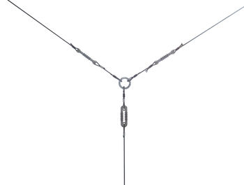 Low angle view of chain against clear sky