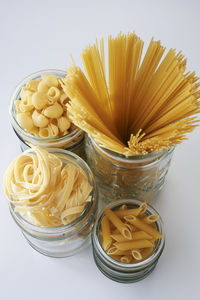 Close-up of raw pasta on table