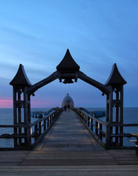 View of pier over sea against sky