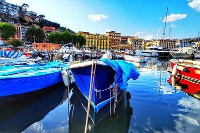 Boats moored in harbor