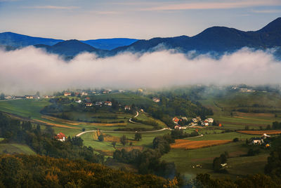 Clouds of fog are a frequent occurrence in this hilly part of slovenia. this is one such scene.