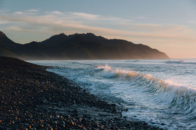 Scenic view of sea against sky during sunset