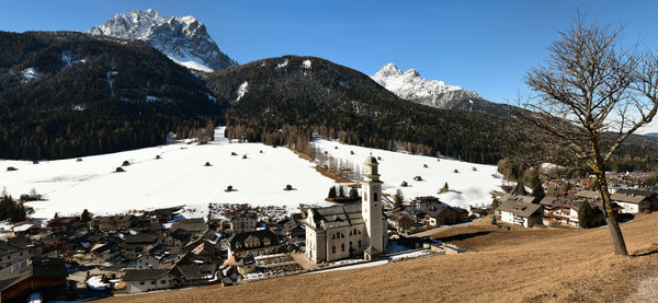 Scenic view of snowcapped mountains against sky