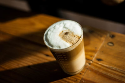 High angle view of cappuccino on table