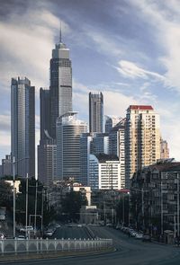 Modern buildings in city against sky