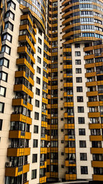 Low angle view of modern buildings in city