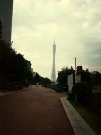 View of eiffel tower against cloudy sky