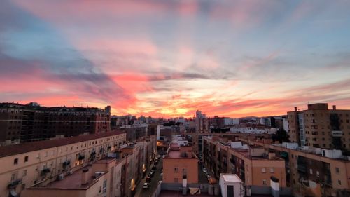 Cityscape against sky during sunset