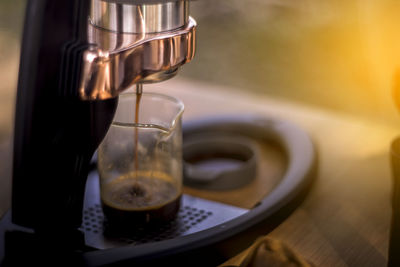 Close-up of coffee cup on table