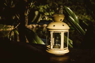 Close-up of lantern on table