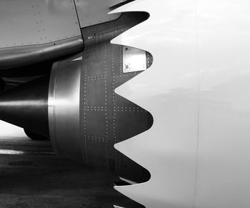 Close-up of airplane against sky