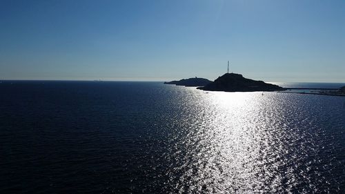 Scenic view of sea against clear sky