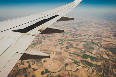 Cropped image of airplane wing