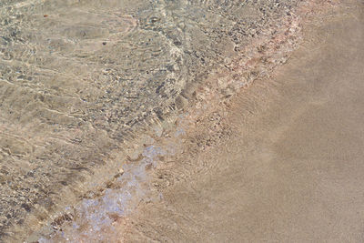 High angle view of sand on beach