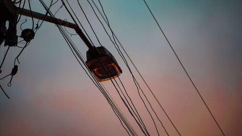 Low angle view of sailboat against sky during sunset