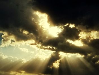 Low angle view of clouds in sky during sunset