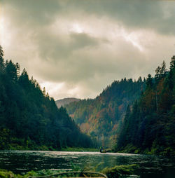 Scenic view of mountains against dramatic sky