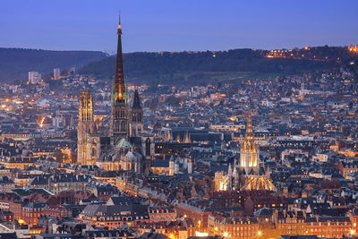 High angle view of city buildings at dusk