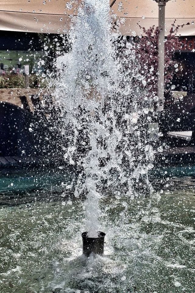 water, splashing, motion, wet, surf, wave, fountain, puddle, waterfront, reflection, high angle view, sea, spraying, rain, day, outdoors, rippled, built structure, nature, flowing water