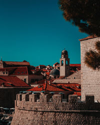 Old buildings against blue sky