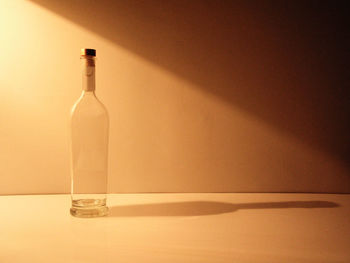 Close-up of wine bottles on table