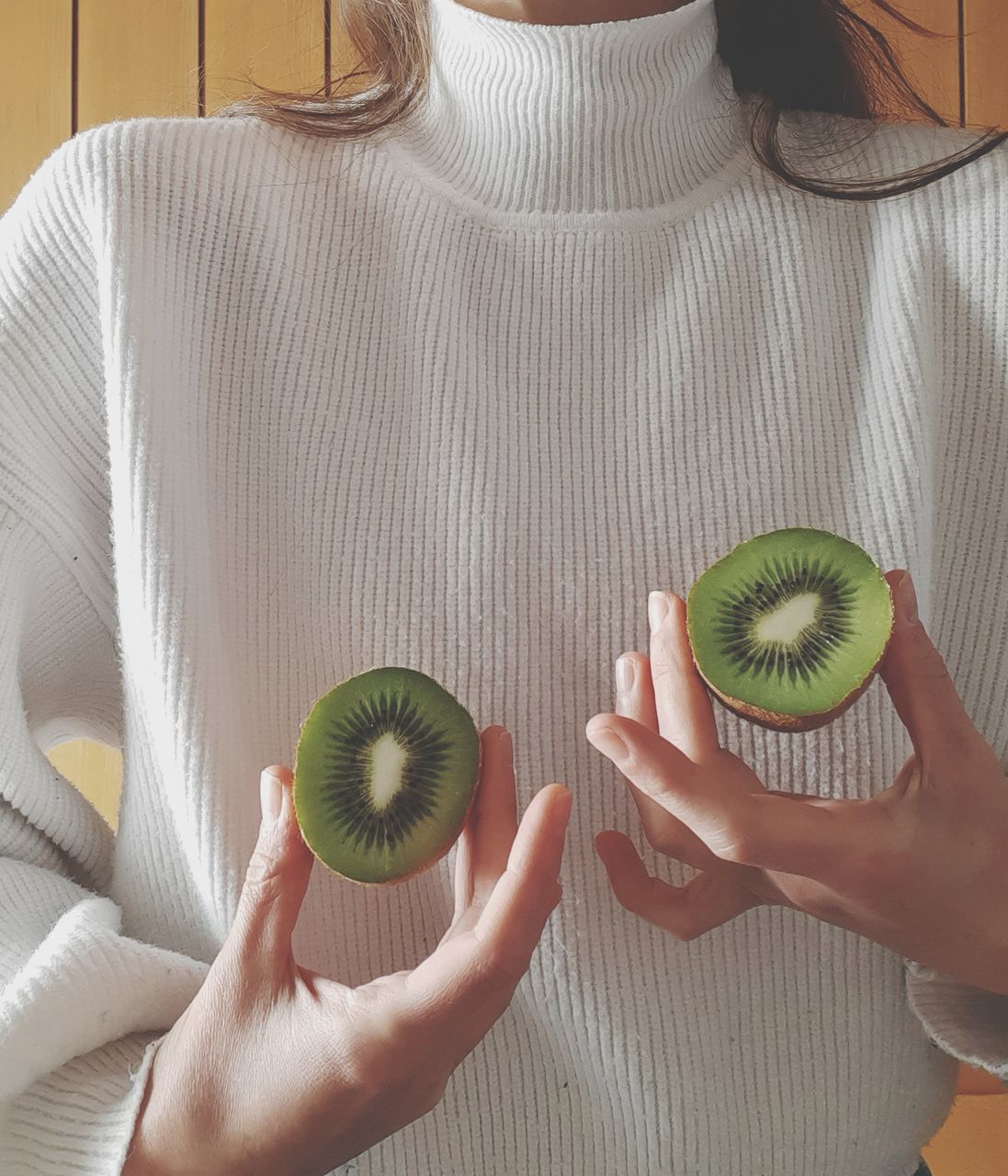 healthy eating, food and drink, fruit, food, human hand, hand, women, wellbeing, holding, human body part, indoors, lifestyles, freshness, real people, kiwi, adult, one person, kiwi - fruit, healthy lifestyle, finger