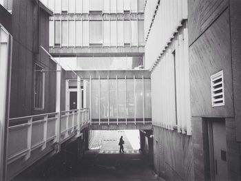 Woman standing in front of building