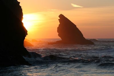 Scenic view of sea against sky during sunset