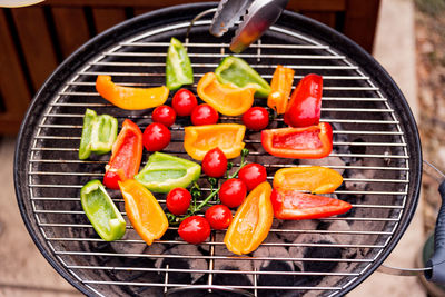 High angle view of fresh vegetables on barbecue grill