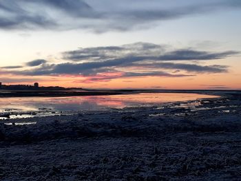 Scenic view of sea against sky during sunset