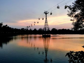 Scenic view of lake at sunset