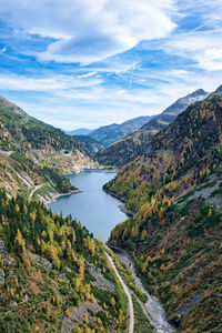 Scenic view of lake amidst mountains against sky, malta valley austria