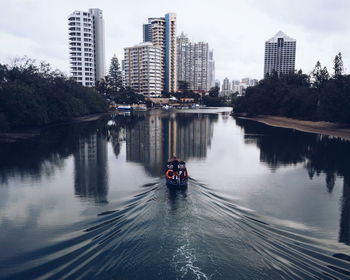 Reflection of buildings in river