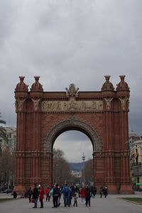 People in front of historical building