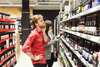 Young couple shopping in supermarket