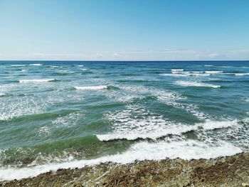 Scenic view of sea against clear sky