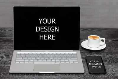 Close-up of coffee cup on table