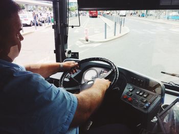 Close-up of man driving car