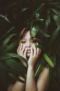 Portrait of a girl on plant