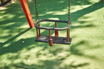 Empty swing in park