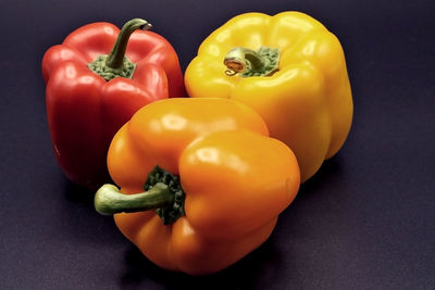 Close-up of yellow bell peppers on table