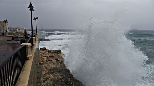 Waves splashing on shore
