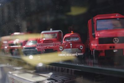 Red car on street in city