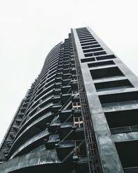 Low angle view of skyscraper against clear sky
