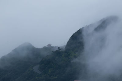 Scenic view of mountain in foggy weather