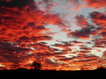 Low angle view of dramatic sky during sunset