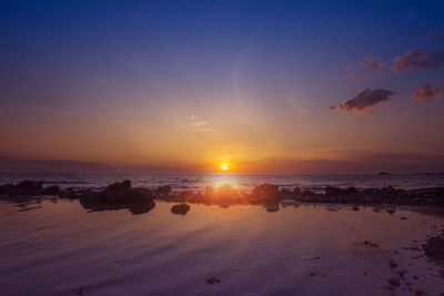 Scenic view of sea against sky during sunset