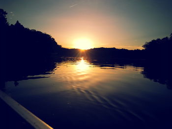 Scenic view of sunset over river