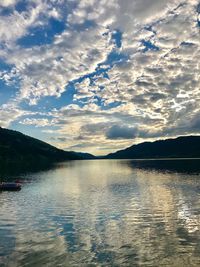 Scenic view of lake against sky during sunset