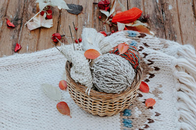 Autumn knitting of warm clothes. woolen balls of knitting needles 